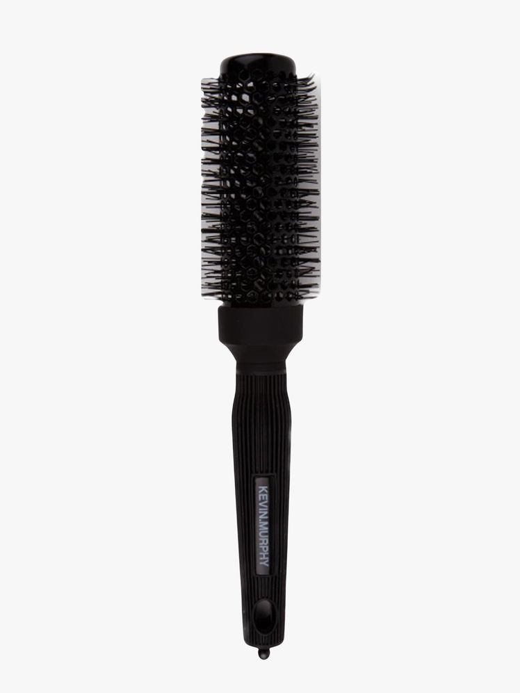 Hair brush on a flat background.