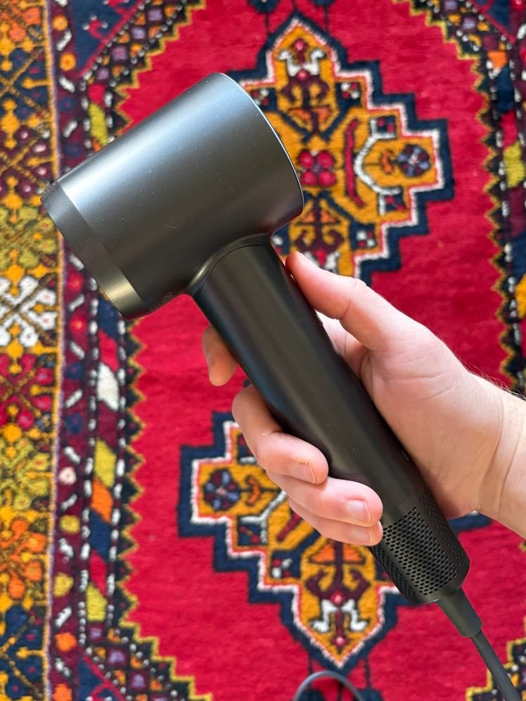 قد تحتوي الصورة على: جهاز منزلي، ومجفف شعر، وجهاز، وجهاز كهربائي